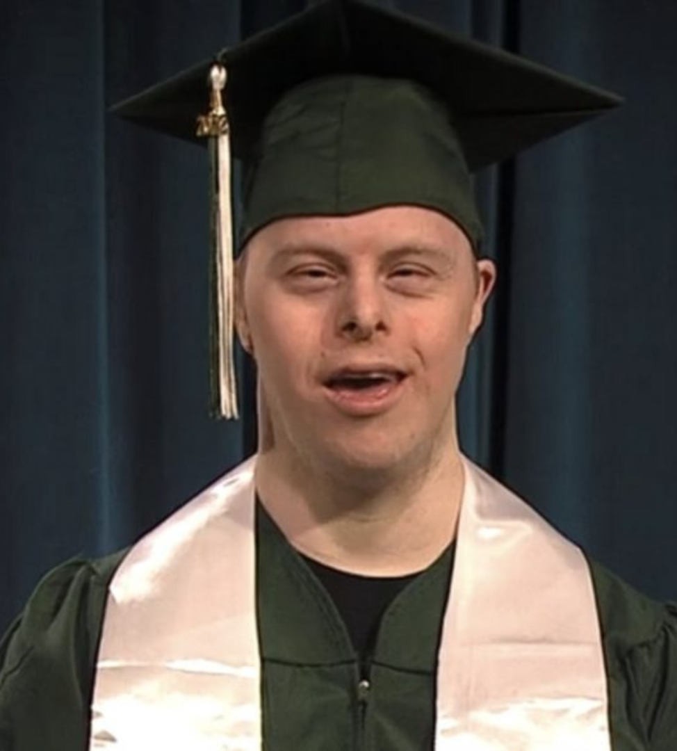 Student with Down Syndrome makes history by being first to graduate from his college with the condition
