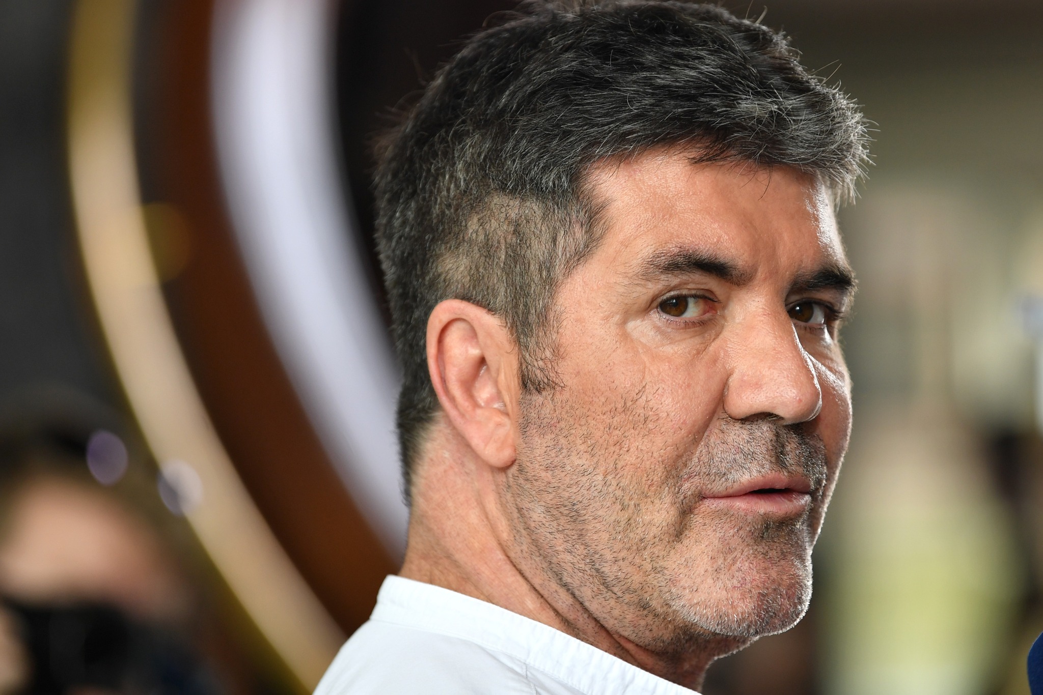 Simon Cowell trades life of fame for new role as stay-at-home dad – wife now runs his company